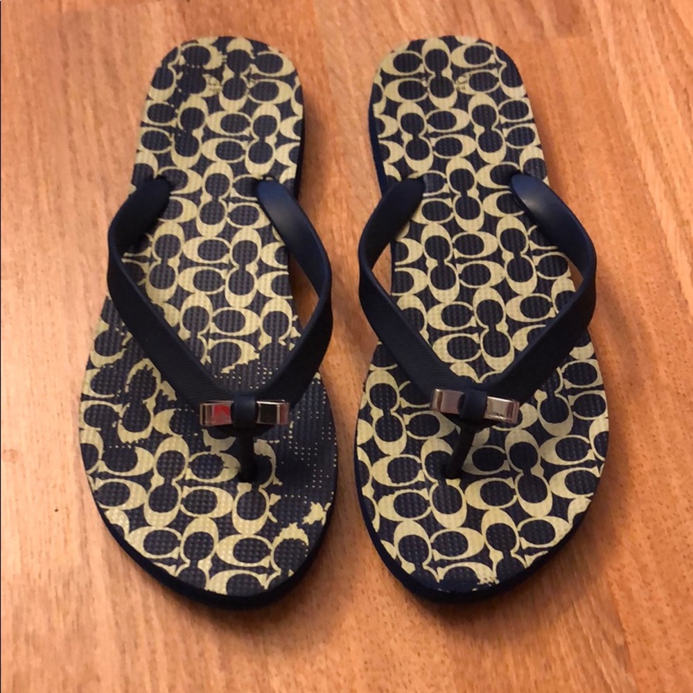 Coach flip flops. Size 7/8.